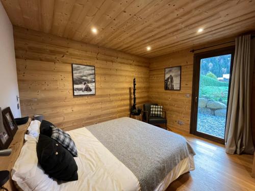 Posteľ alebo postele v izbe v ubytovaní Chalet les 3 cerfs