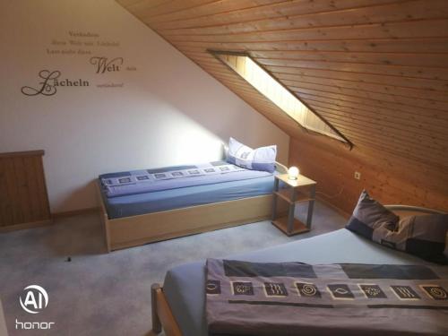 Postel nebo postele na pokoji v ubytování Ferienwohnung Hilde und Martin Weiß
