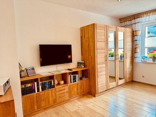 Televisyen dan/atau pusat hiburan di Ferienwohnung Haus Feig
