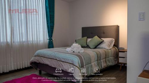 Giường trong phòng chung tại Céntrico y Moderno mono ambiente