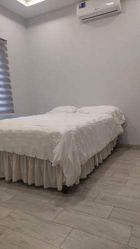 Postel nebo postele na pokoji v ubytování CAROl Boutique Hotel