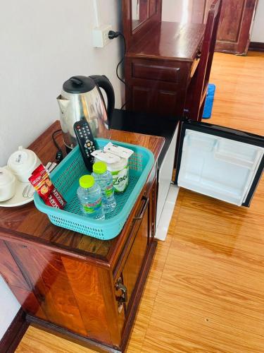 a tray of food on a table in a room at Vang Vieng Global Hostel in Vang Vieng