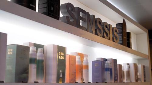 a row of books on a shelf at Parkhotel Horst - Venlo in Horst