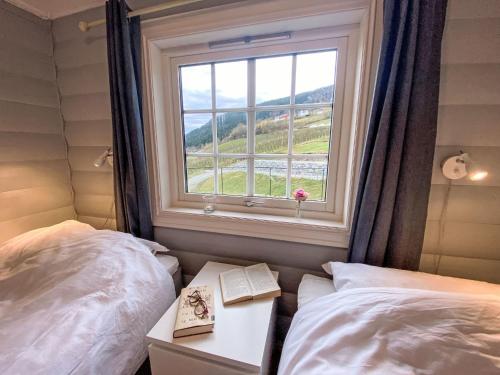 Postel nebo postele na pokoji v ubytování Chalet Krampehaugen by Interhome
