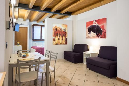 Coin salon dans l'établissement Dimore Verona