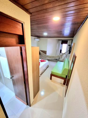 Katil atau katil-katil dalam bilik di Pousada Shalom Beach