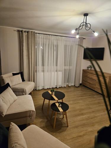 Posezení v ubytování Apartamenty i Pokoje Koleczkowo