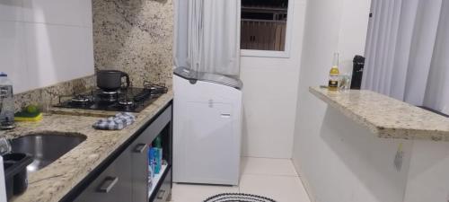 Η κουζίνα ή μικρή κουζίνα στο Apartamento das Estrelas