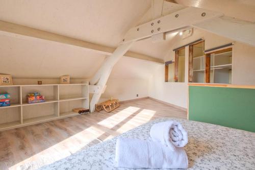Ένα ή περισσότερα κρεβάτια σε δωμάτιο στο Le petit chalet