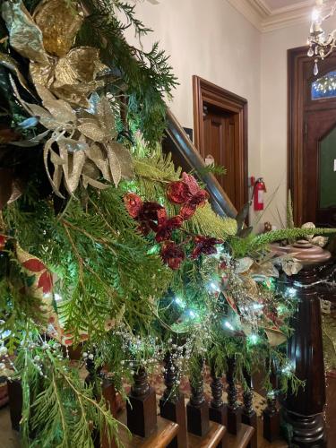 a christmas tree on the side of a staircase at Norfolk Guest House Inn in Guelph