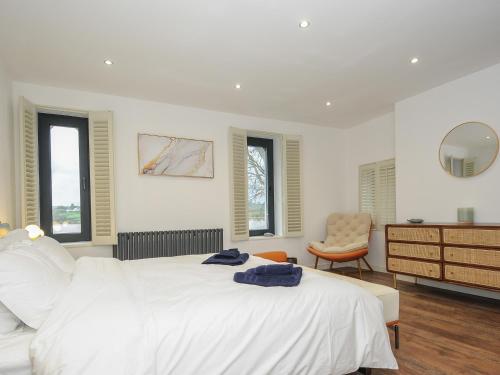 En eller flere senge i et værelse på Boathyde