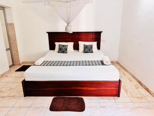 Cama o camas de una habitación en Surewo Apartment