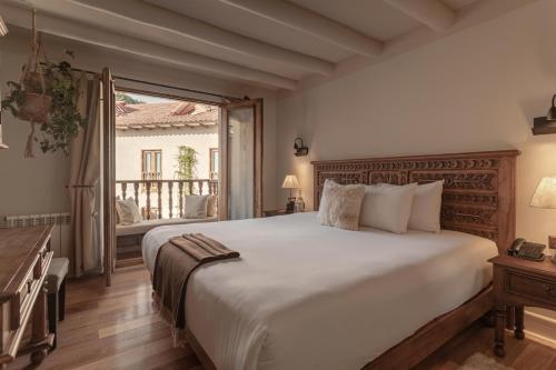Postel nebo postele na pokoji v ubytování Antigua Casona San Blas