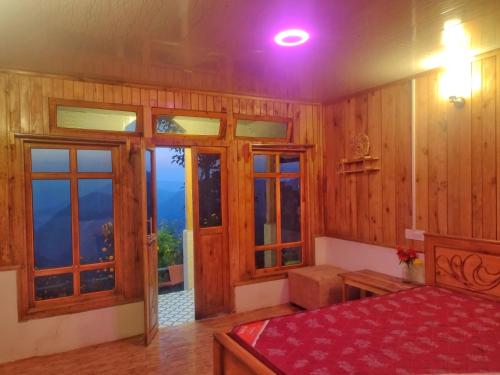Postel nebo postele na pokoji v ubytování Nimzong homestay