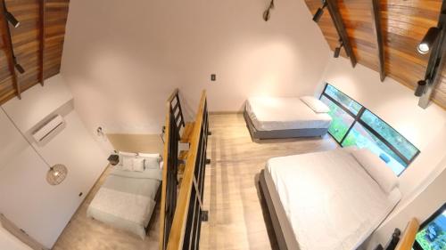 an overhead view of a room with two beds at Casa en el Cielo in Cali