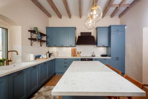 Kuchyň nebo kuchyňský kout v ubytování Achillion Casa Conti 1840
