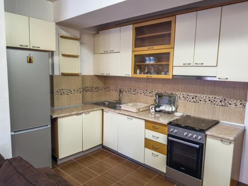 Η κουζίνα ή μικρή κουζίνα στο Rafto Apartment