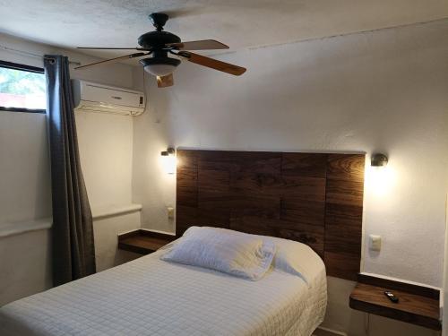 Postel nebo postele na pokoji v ubytování Hotel Rath