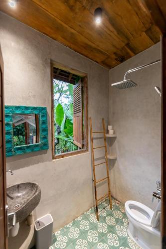 Ванная комната в Rumah Guci