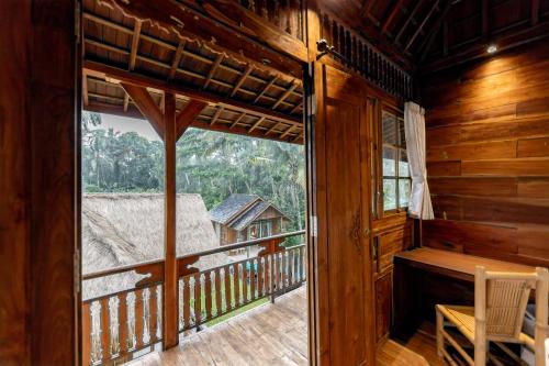 Балкон или терраса в Rumah Guci