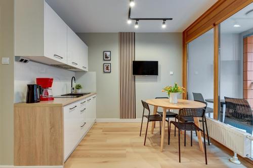 Η κουζίνα ή μικρή κουζίνα στο Staywin Apartments Chmielna Park