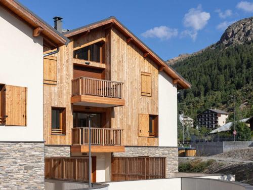 Photo de la galerie de l'établissement Appartement neuf avec terrasse et garage au Monêtier-les-Bains - FR-1-808-18, au Monêtier-les-Bains