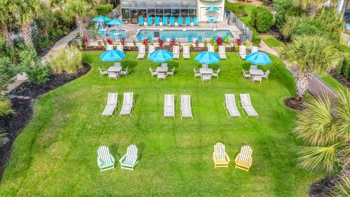 an aerial view of a lawn with chairs and umbrellas at Ocean View Double Suite! Sleeps 4 Meridian Plaza 705 in Myrtle Beach