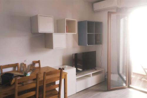 Μια τηλεόραση ή/και κέντρο ψυχαγωγίας στο Apartamento en Altea - Casco antiguo y Vistas al mar