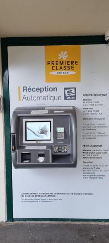 a display of a rec room machine on a sign at HOTEL PREMIERE CLASSE Rouen Sud Oissel in Saint-Étienne-du-Rouvray