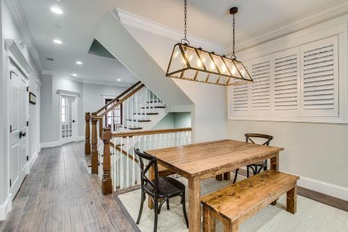 a dining room with a wooden table and chairs at The Sono Chicago in Chicago