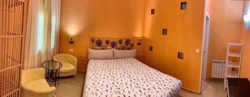 Postel nebo postele na pokoji v ubytování Hostal Arco Iris