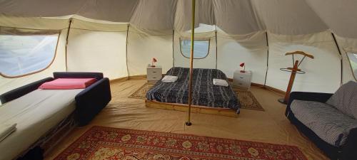 Postel nebo postele na pokoji v ubytování terrebio Glamping