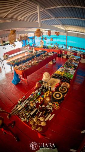 a long table filled with lots of different types of items at Uiara Amazon Resort in Manaus