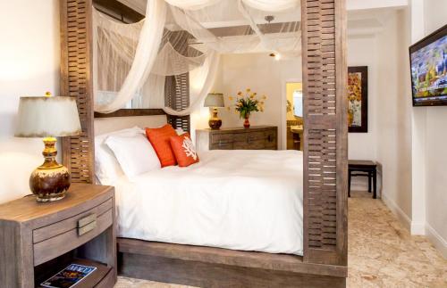 Ένα ή περισσότερα κρεβάτια σε δωμάτιο στο The Beach House VI