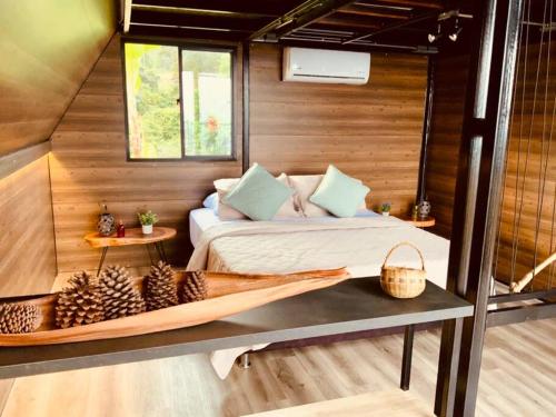 Ένα ή περισσότερα κρεβάτια σε δωμάτιο στο Cabaña Ecolodge Buenos Aires