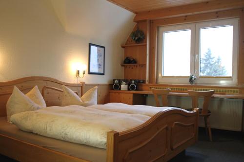 Postel nebo postele na pokoji v ubytování Haus Vergissmeinnicht