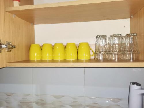 Η κουζίνα ή μικρή κουζίνα στο Azuka Luxury Apartments
