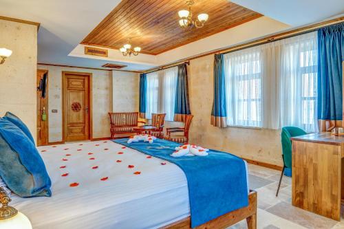 Letto o letti in una camera di Unique Cappadocia Palace