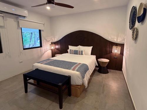 Katil atau katil-katil dalam bilik di Reunion Hotel and Wellness Center