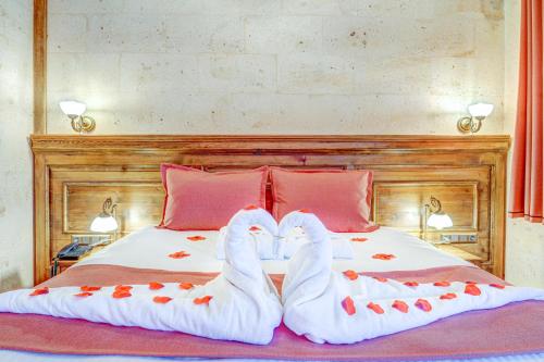 Letto o letti in una camera di Unique Cappadocia Palace
