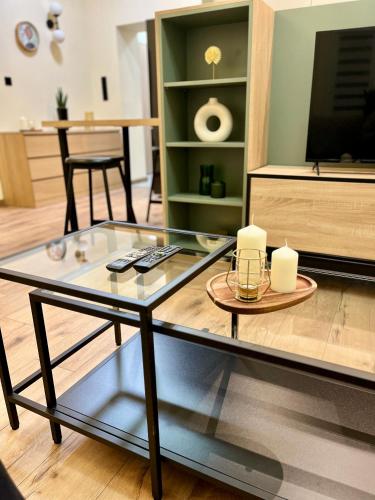 Telewizja i/lub zestaw kina domowego w obiekcie Bastet Apartamenty