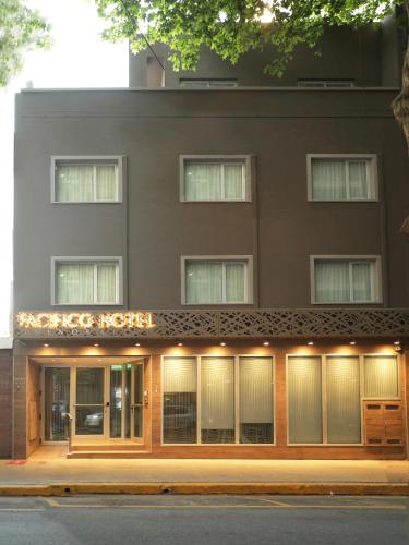 a building with a sign for a hotel at Pacifico Hotel in Buenos Aires