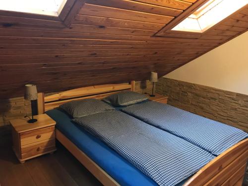 Postel nebo postele na pokoji v ubytování Horská chata Ladonhora