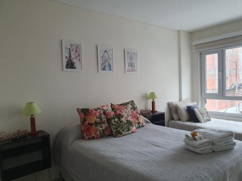 En eller flere senge i et værelse på APA Sorken - cochera cubierta