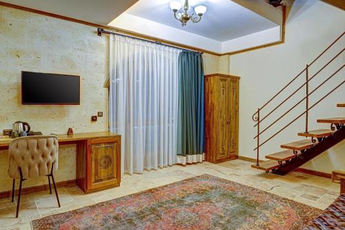 TV o dispositivi per l'intrattenimento presso Unique Cappadocia Palace