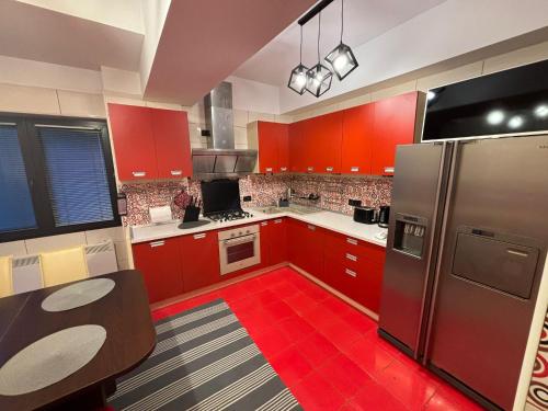 Kuchyň nebo kuchyňský kout v ubytování Conta Apartment