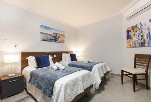 Postel nebo postele na pokoji v ubytování Luxurious & Spacious 2BD Accomodation at The Podium - Yacht Marina Area, Close to Valletta
