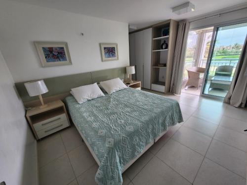 Postel nebo postele na pokoji v ubytování Golf Ville l Apto Nascente de Luxo