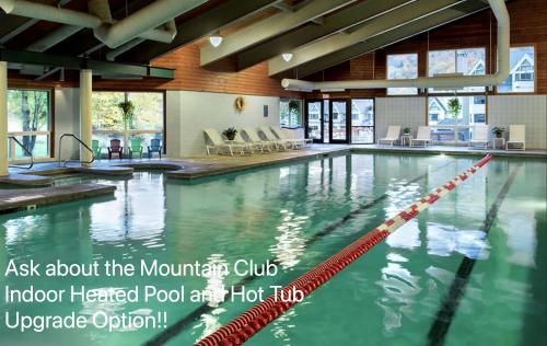 an indoor heated pool at the mountain club indoor heated pool artichoke poolitis at Mountain Retreat Hot Tub & Walk To Loon! in Lincoln
