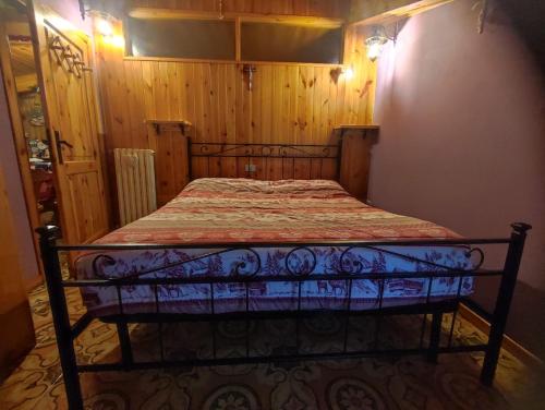Postel nebo postele na pokoji v ubytování Tra sogni e realtà Roccaraso